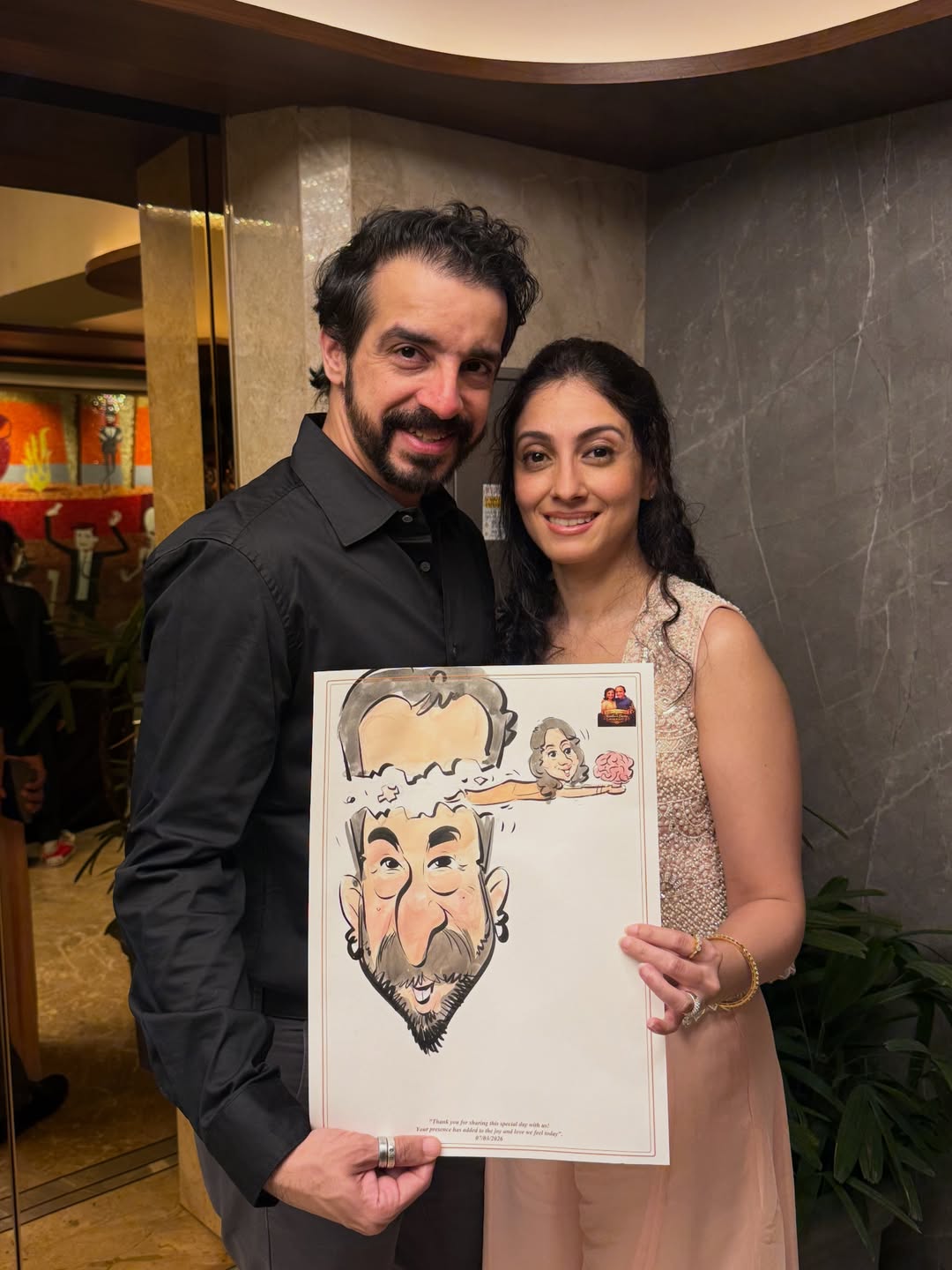 Stylish couple holding a live black-tie reception caricature of the groom